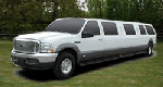 Chauffeur stretch white Ford Excursion 4x4 limousine hire in UK