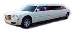 Chauffeur stretched white Chrysler C300 Baby Bentley limo hire in UK