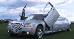 Chauffeur stretch silver Chrysler C300 Baby Bentley limousine hire with Lamborghini doors in Leeds, Bradford, Huddersfield, West Yorkshire.
