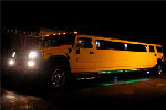 Chauffeur stretch yellow Hummer H2 limo hire in Hull, Scunthorpe, Lincoln, Grimsby, Lincolnshire, East Yorkshire
