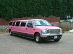Chauffeur stretched pink Lincoln Navigator limousine hire in Sheffield, Rotherham, Doncaster, Chesterfield, South Yorkshire