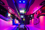 Chauffeur driven Party Bus limo hire Play Boy den interior in Bristol, Gloucester, Cheltenham, Cardiff, Wales, Weston Super Mare, and Bath.