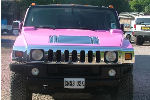 Chauffeur stretched pink Hummer H2 limo hire in Bristol, Gloucester, Cheltenham, Cardiff, Wales, Weston Super Mare, and Bath.